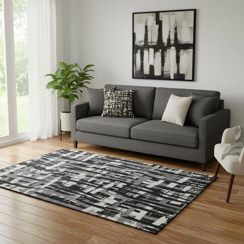5' X 8' Black And Ivory Striped Washable Area Rug With UV Protection