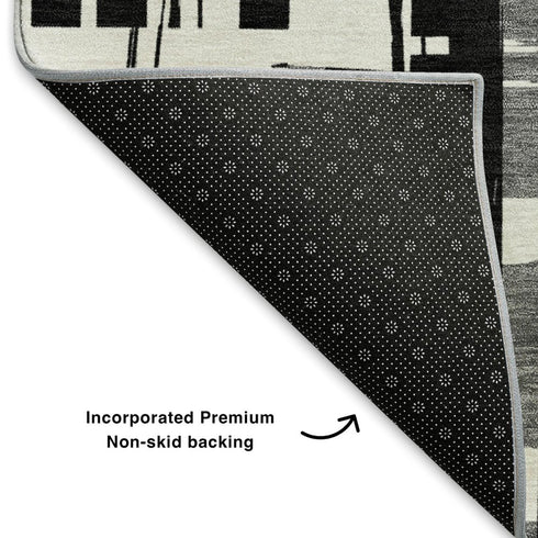 5' X 8' Black And Ivory Striped Washable Area Rug With UV Protection