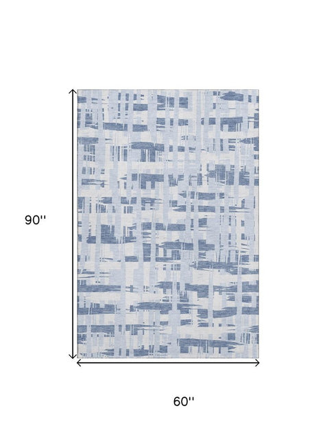 5' X 8' Blue And Ivory Striped Washable Area Rug With UV Protection