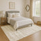 8' X 10' Ivory And Tan Striped Washable Area Rug With UV Protection