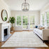 8' X 10' Ivory And Tan Striped Washable Area Rug With UV Protection