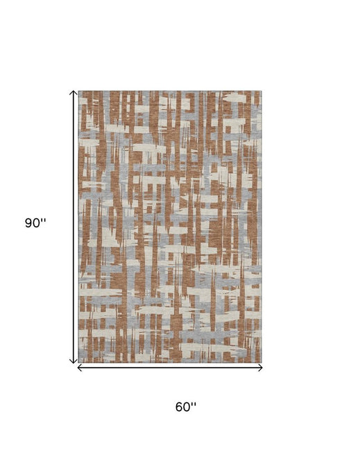 5' X 8' Rust And Ivory Striped Washable Area Rug With UV Protection