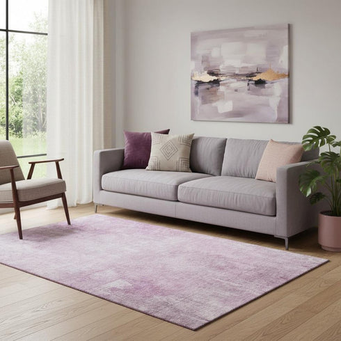 5' X 8' Pink And Ivory Abstract Washable Area Rug With UV Protection