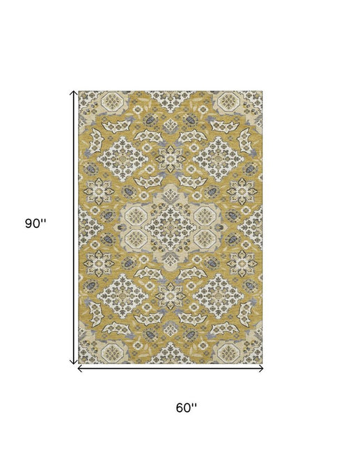 5' X 8' Gold And Ivory Floral Medallion Washable Area Rug With UV Protection