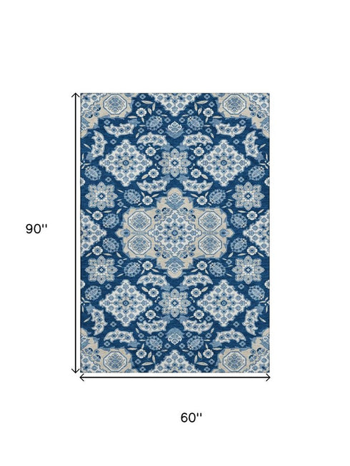 5' X 8' Navy Blue And Ivory Floral Medallion Washable Area Rug With UV Protection