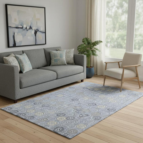 5' X 8' Blue And Ivory Geometric Washable Area Rug With UV Protection