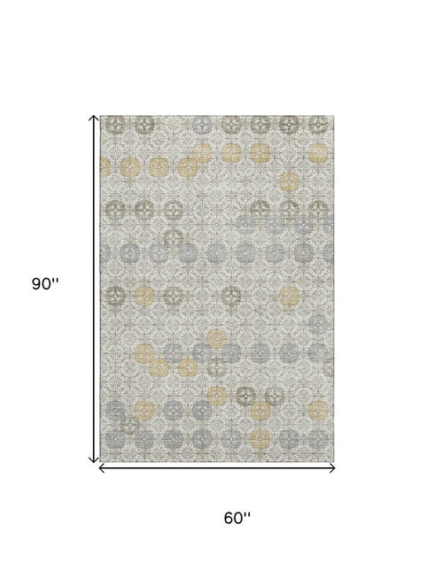 5' X 8' Ivory Gold And Gray Geometric Washable Area Rug With UV Protection