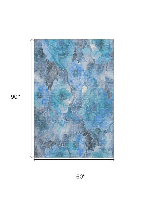 5' X 8' Blue Gray And Ivory Floral Washable Area Rug With UV Protection