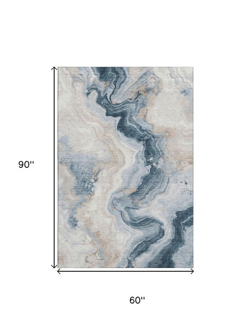 5' X 8' Beige Blue And Ivory Abstract Washable Area Rug With UV Protection