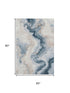 5' X 8' Beige Blue And Ivory Abstract Washable Area Rug With UV Protection