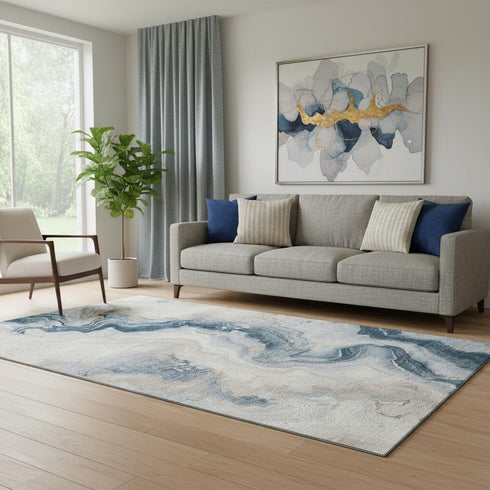 5' X 8' Beige Blue And Ivory Abstract Washable Area Rug With UV Protection