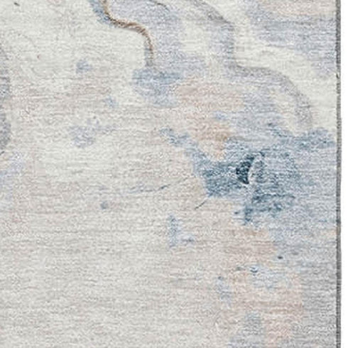 5' X 8' Beige Blue And Ivory Abstract Washable Area Rug With UV Protection