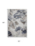 5' X 8' Beige Blue And Ivory Abstract Washable Area Rug With UV Protection