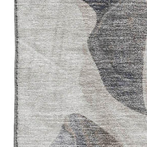 5' X 8' Beige Blue And Ivory Abstract Washable Area Rug With UV Protection