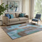 5' X 8' Brown And Blue Abstract Washable Area Rug With UV Protection