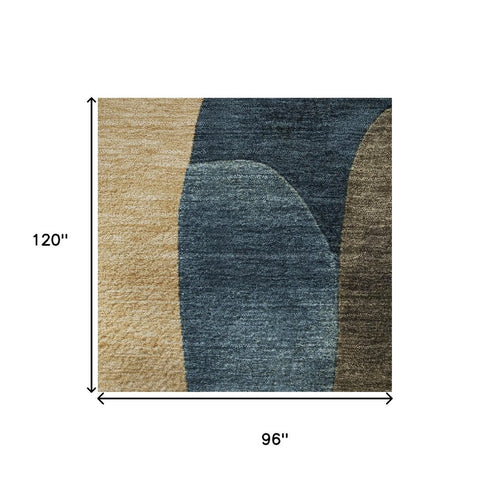 8' X 10' Navy Blue Orange And Rust Abstract Washable Area Rug With UV Protection