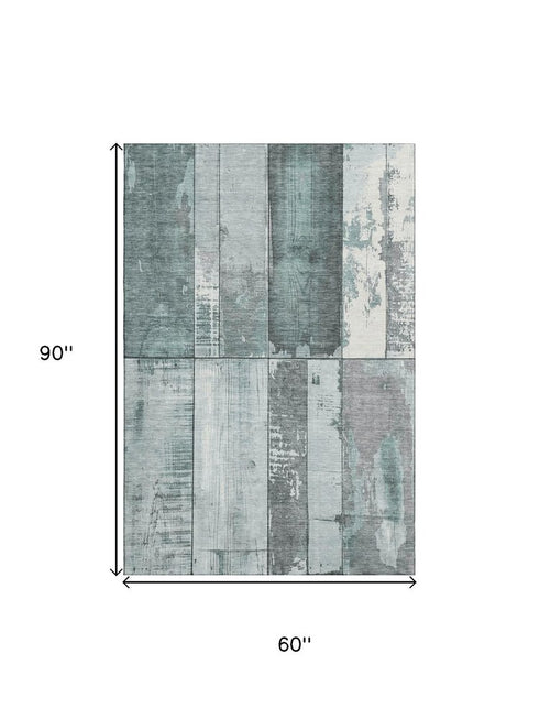 5' X 8' Pale Aqua And Gray Geometric Washable Area Rug With UV Protection