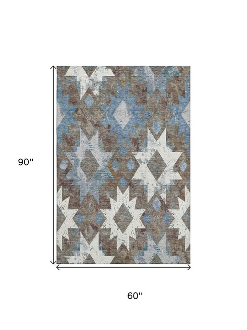 5' X 8' Brown Blue And Ivory Southwestern Washable Area Rug With UV Protection