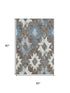 5' X 8' Brown Blue And Ivory Southwestern Washable Area Rug With UV Protection