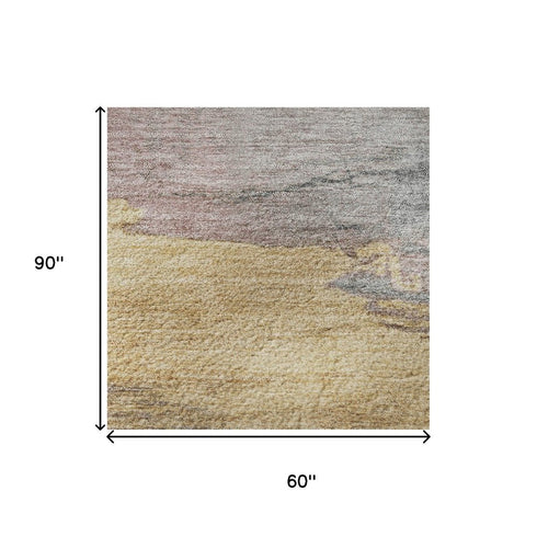 5' X 8' Blush Gold And Ivory Abstract Washable Area Rug With UV Protection