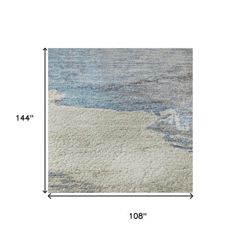 9' X 12' Sky Blue Gray And Ivory Abstract Washable Area Rug With UV Protection