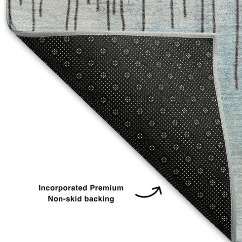 9' X 12' Sky Blue Gray And Ivory Abstract Washable Area Rug With UV Protection