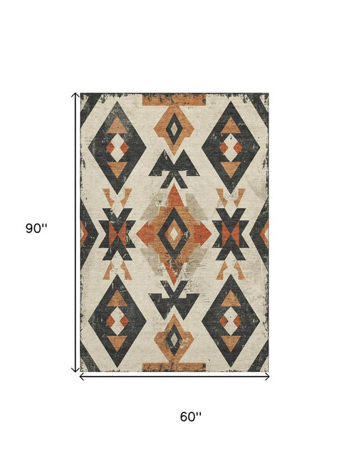 5' X 8' Ivory Orange And Charcoal Southwestern Washable Area Rug With UV Protection