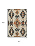 5' X 8' Ivory Orange And Charcoal Southwestern Washable Area Rug With UV Protection