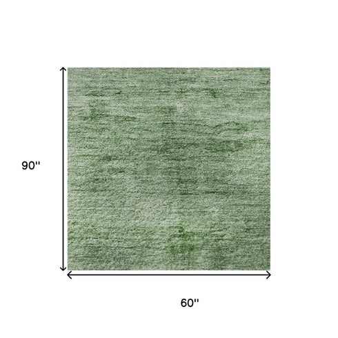 5' X 8' Green And Beige Abstract Washable Area Rug With UV Protection