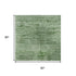 5' X 8' Green And Beige Abstract Washable Area Rug With UV Protection