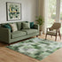 5' X 8' Green And Beige Abstract Washable Area Rug With UV Protection