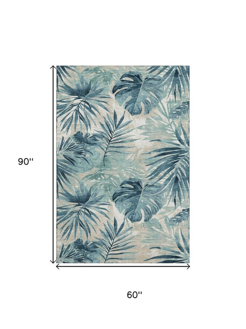 5' X 8' Teal And Ivory Floral Washable Area Rug With UV Protection
