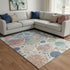 8' X 10' Denim Blue Peach And Ivory Geometric Washable Area Rug With UV Protection