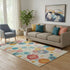 5' X 8' Beige Teal And Orange Geometric Washable Area Rug With UV Protection