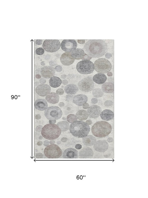 5' X 8' Ivory Gray And Silver Geometric Washable Area Rug With UV Protection
