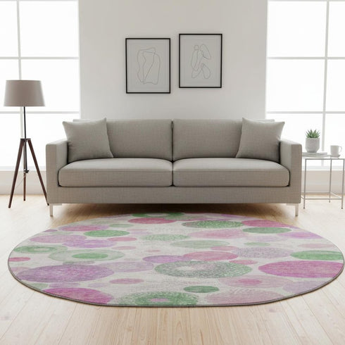 8' Pink Green And Ivory Geometric Washable Round Rug With UV Protection