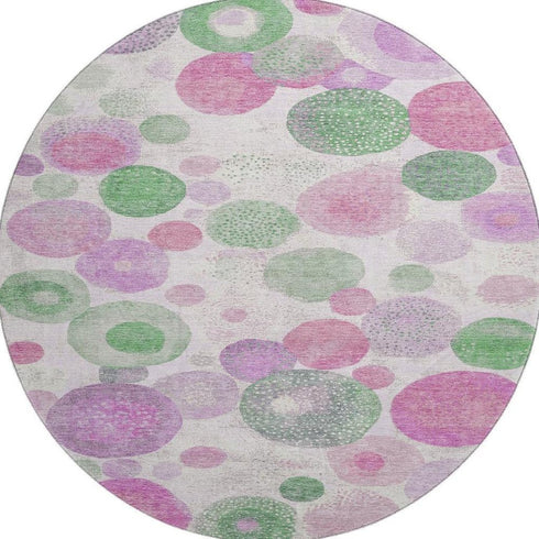 8' Pink Green And Ivory Geometric Washable Round Rug With UV Protection