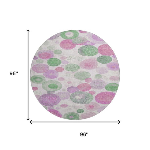 8' Pink Green And Ivory Geometric Washable Round Rug With UV Protection