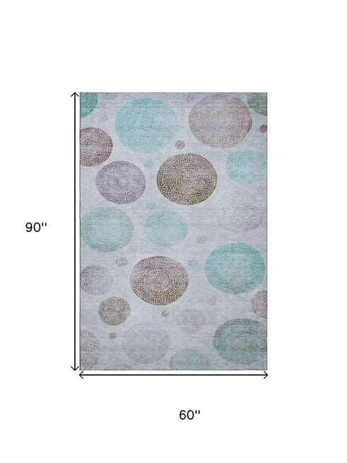 5' X 8' Blue Brown And Teal Geometric Washable Area Rug With UV Protection