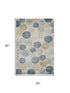 5' X 8' Beige Blue And Wheat Geometric Washable Area Rug With UV Protection