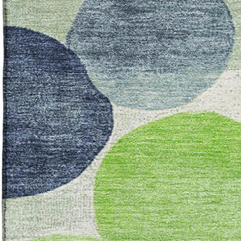 5' X 8' Navy Blue Green And Ivory Geometric Washable Area Rug With UV Protection