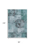 8' X 10' Teal And Gray Geometric Washable Area Rug With UV Protection