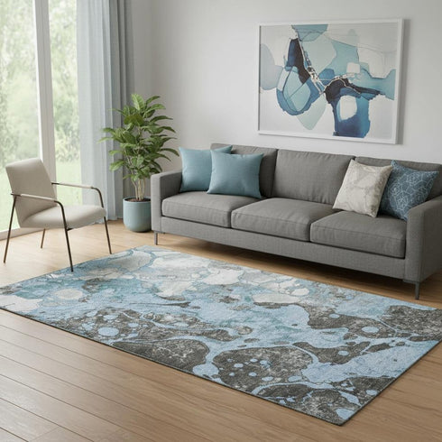 5' X 8' Blue Gray And Ivory Abstract Washable Area Rug With UV Protection