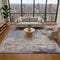 9' X 12' Blue Pink And Ivory Abstract Washable Area Rug With UV Protection