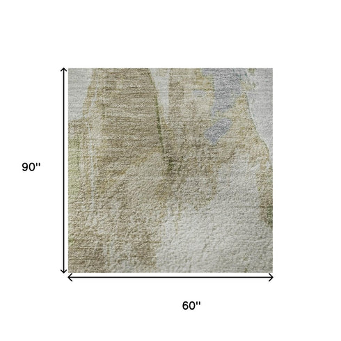 5' X 8' Beige Blue And Ivory Abstract Washable Area Rug With UV Protection