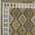 5' X 8' Brown And Ivory Tribal Washable Area Rug With UV Protection