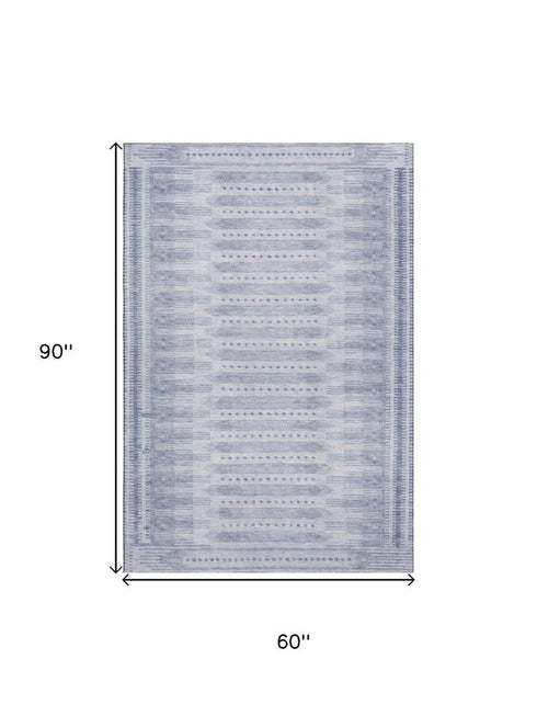 5' X 8' Blue And Denim Blue Geometric Washable Area Rug With UV Protection