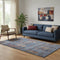 5' X 8' Blue And Rust Floral Washable Area Rug With UV Protection