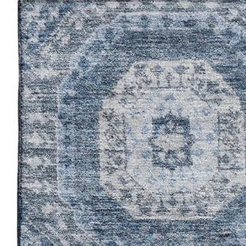 5' X 8' Blue And Ivory Abstract Geometric Washable Area Rug With UV Protection