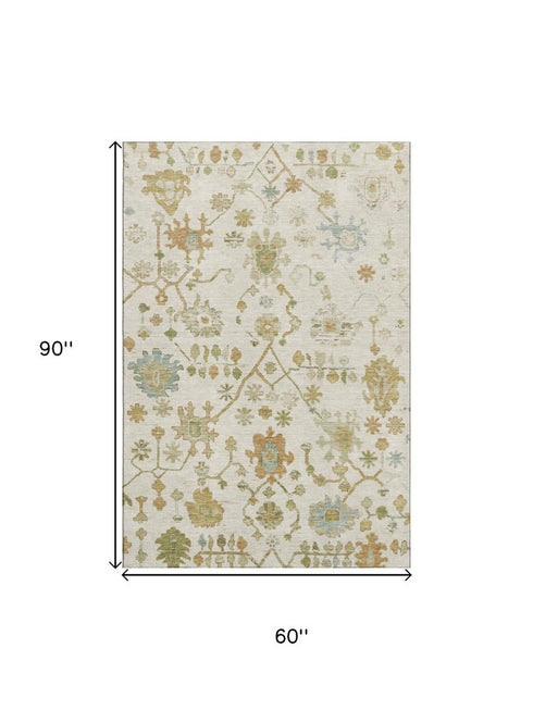 5' X 8' Ivory Gold And Blue Floral Washable Area Rug With UV Protection
